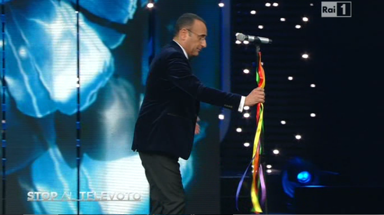 Il secondo Sanremo di Conti ignora i messaggi Arcobaleno e reprime la Raffaele. Garko barman anche sul palco