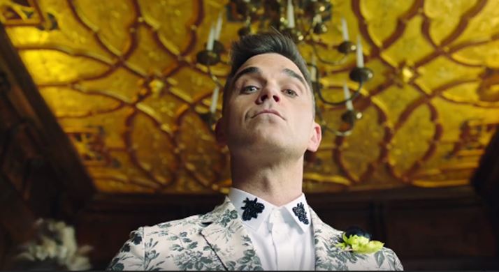 Sanremo 2017, Robbie Williams ospite: il ricordo delle sue partecipazioni (e della lite con Gianni Morandi)