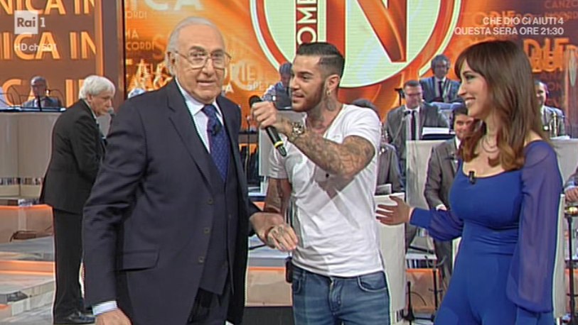 Emis Killa a Domenica in. Baudo: “Questo è un brutto ceffo”. Poi (quasi) si ricrede