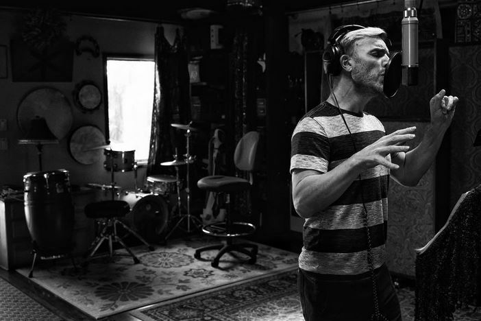 Robbie Williams torna con i Take That per registrare una canzone di Natale?