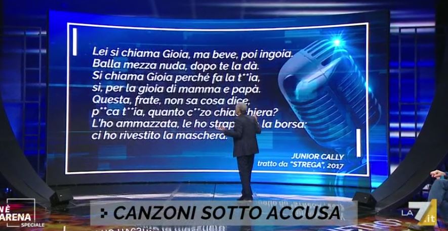 Junior Cally e la canzone “Strega” al centro del dibattito di “Non è l’Arena”: Amadeus assicura la sua presenza in gara
