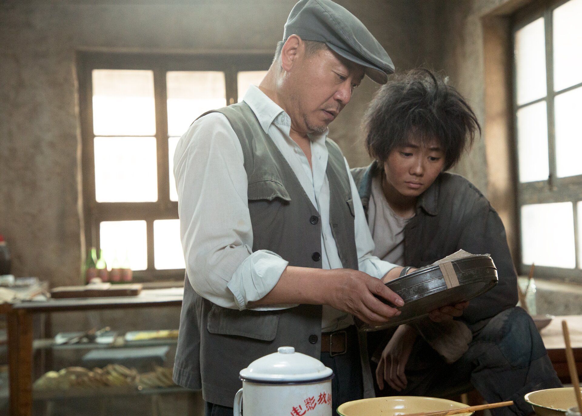 One Second: foto e poster del nuovo film di Zhang Yimou