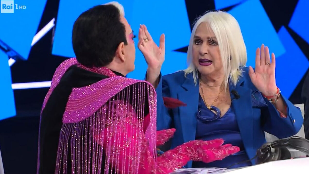 Loretta Goggi a Malgioglio: “Se non parli di Maria De Filippi ti senti male” E Carlo Conti cita C’è posta per te (video)