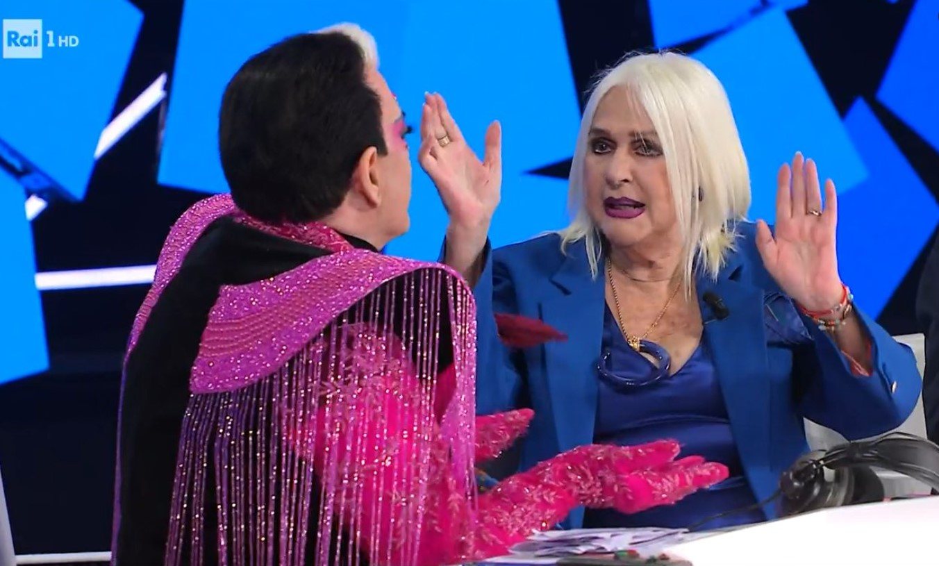 Loretta Goggi a Malgioglio: “Se non parli di Maria De Filippi ti senti male” E Carlo Conti cita C’è posta per te (video)