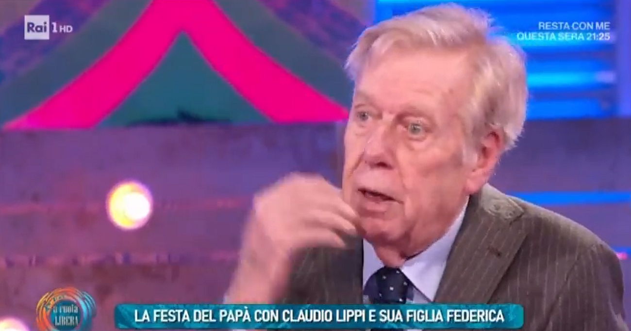 Da noi … a ruota libera: Claudio Lippi dà del “primate” a un ragazzo italo-brasiliano. E sulla paternità: “Mi sono chiesto con rammarico perché non sono nato Malgioglio”