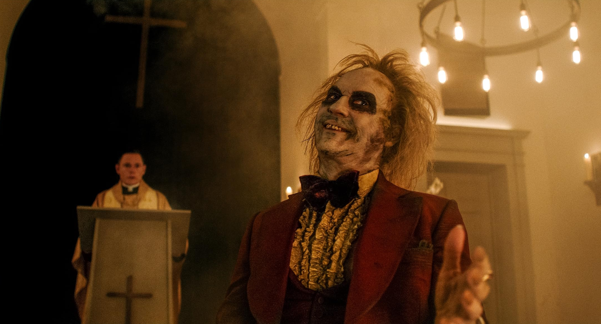 Recensione e colonna sonora di Beetlejuice 2 di Tim Burton con Michael Keaton, Winona Ryder, Jenna Ortega Catherine O'Hara, Monica Bellucci e Willem Dafoe - Al cinema con Warner Bros. Pictures Italia.