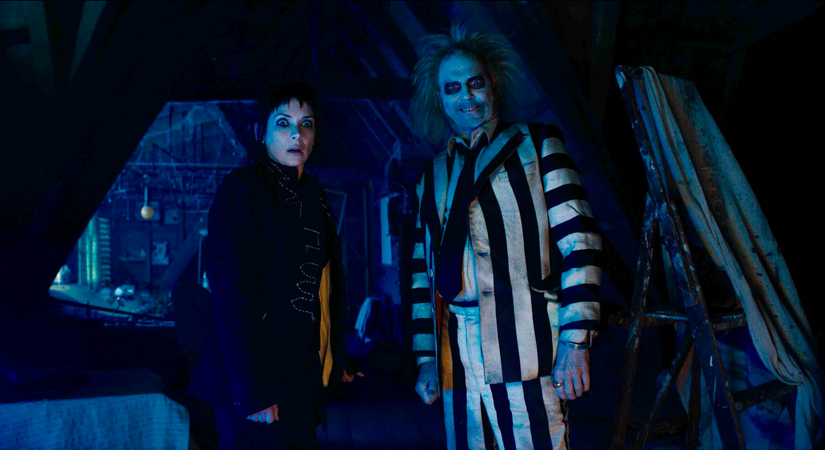 Recensione e colonna sonora di Beetlejuice 2 di Tim Burton con Michael Keaton, Winona Ryder, Jenna Ortega Catherine O'Hara, Monica Bellucci e Willem Dafoe - Al cinema con Warner Bros. Pictures Italia.