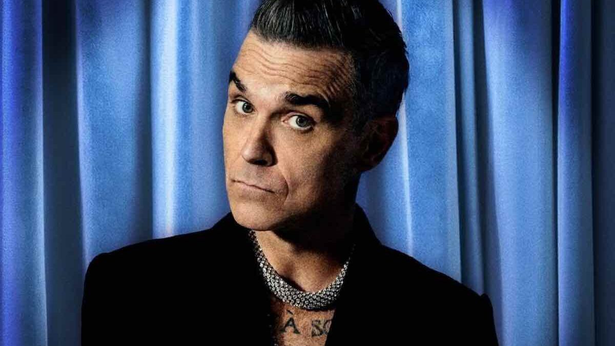 Dietro le quinte di Robbie Williams: il nome deciso dai Take That e il rifiuto shock ai Queen
