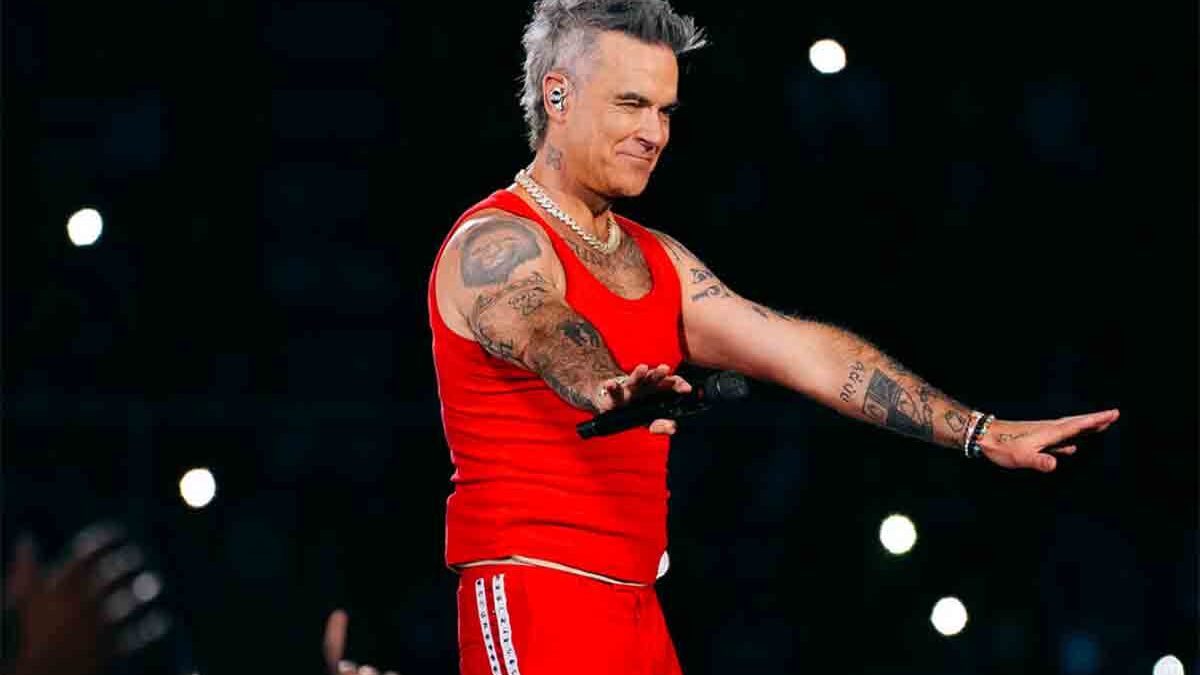 Robbie Williams citato in giudizio dal co-autore di Angels: “Mi ha dato solo gli spiccioli”