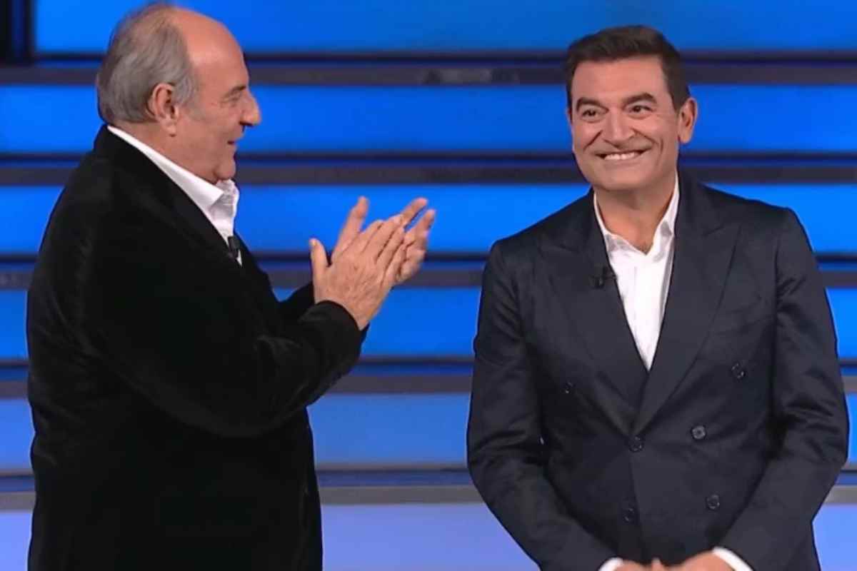 cosa ha fatto gerry scotti max giusti