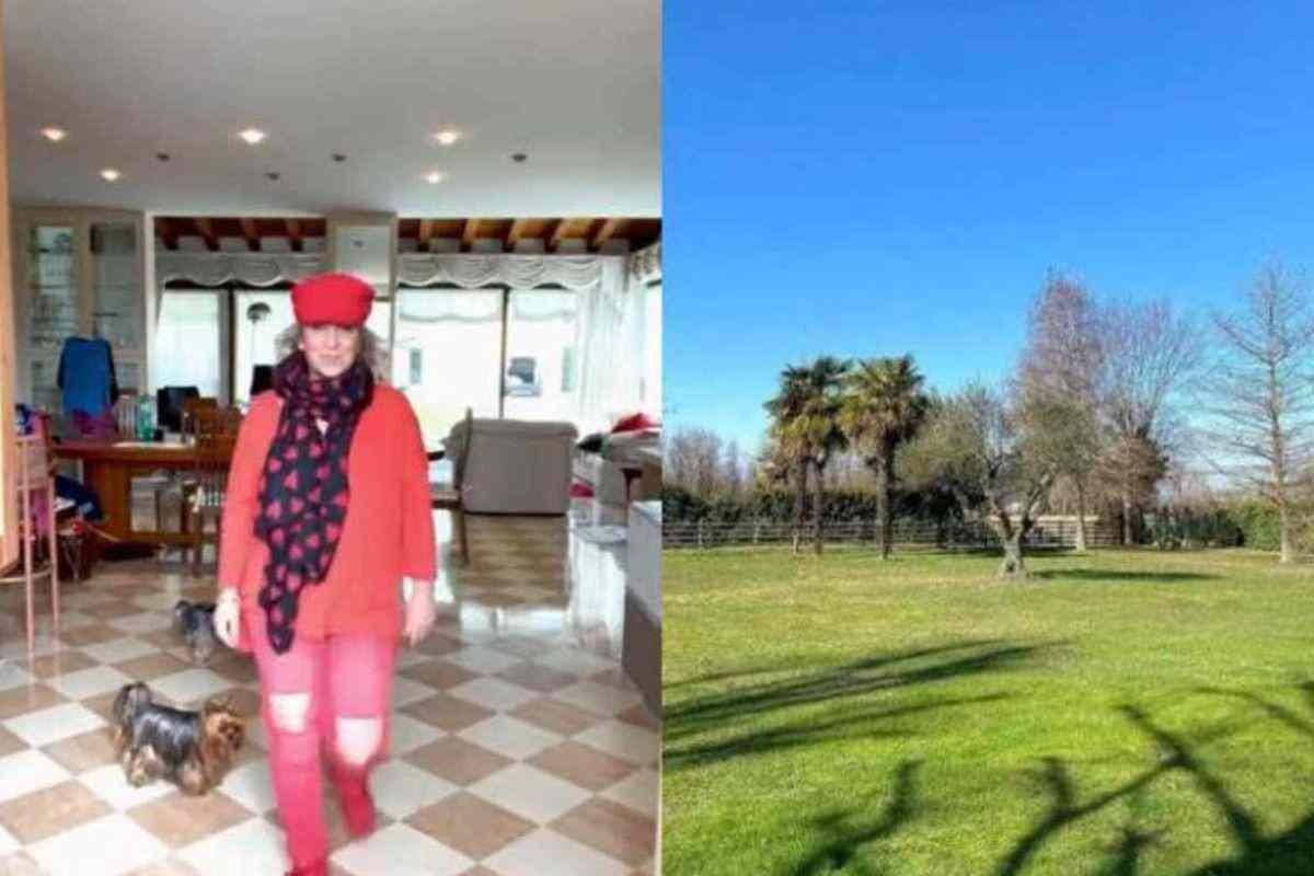 Soggiorno open space di Carolyn Smith con pavimento in marmo bianco e rosa, camino in pietra e grandi vetrate sul giardino.
